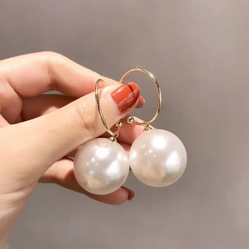 Eleganta stora pärlörhängen