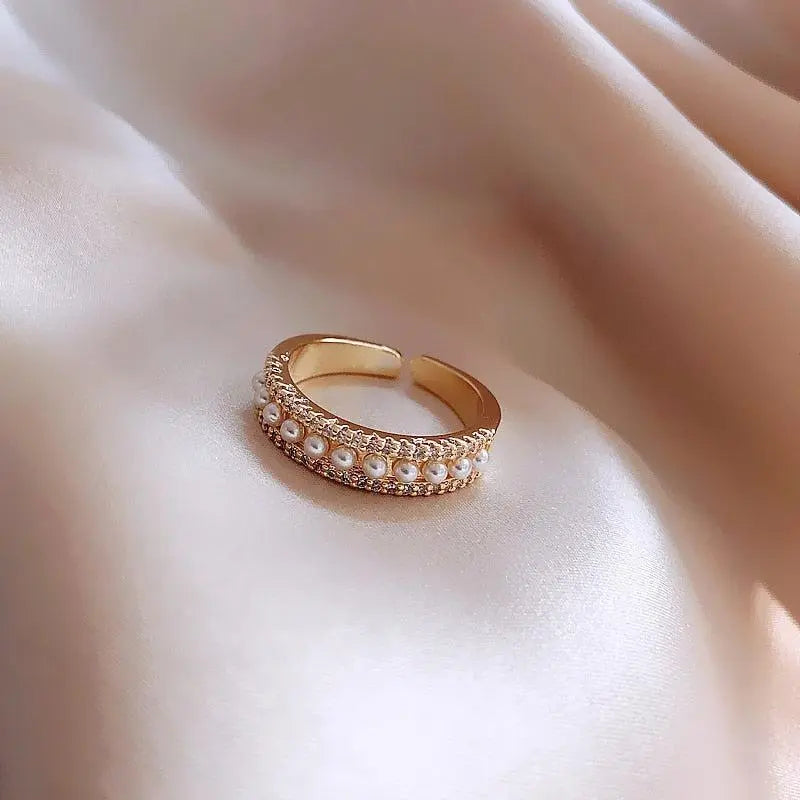 Lyxring i guld och pärlor