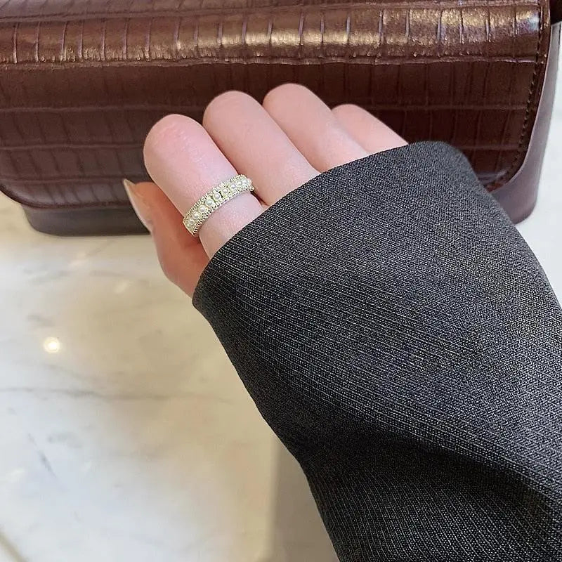 Lyxring i guld och pärlor
