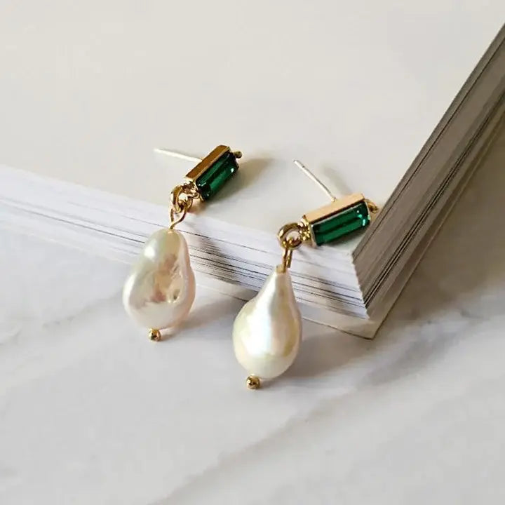 Ohrringe mit Smaragden in Gold
